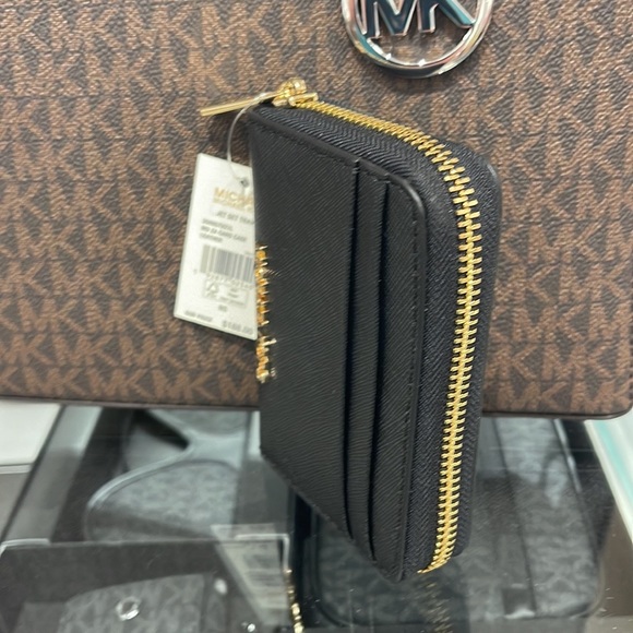Michael Kors Jet Set Travel Medium Zip Around Card Case 
Color: Black
NWT - Picture 9 of 16
